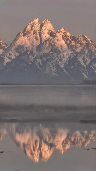 A_Mountain_Range_In_The_Distance_Landscapes_9-16_96